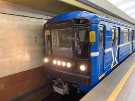 Detailed view of closed, sliding doors seen on a commuter train, located at the station platform photo