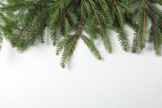 Holidays greeting card or banner composition with pine tree branches. Merry Christmas background and Happy New Year 2023. photo