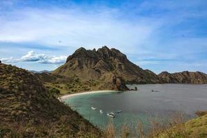 Beautiful View From The Top of Gili Lawa Darat Island in the Evening with Blue Sky and Blue Sea. Komodo National Park, Labuan Bajo, Flores, Indonesia photo