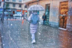 Bilbao, Vizcaya, Spain, 2022 - people with an umbrella in rainy days in Bilbao city photo