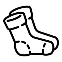 Winter socks icon, outline style vector