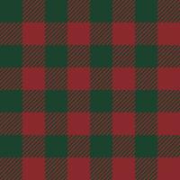 Tartan checked plaids red and green colors. Seamless fabric texture Christmas theme colors background. vector