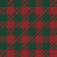 Tartan checked plaids red and green colors. Seamless fabric texture Christmas theme colors background. vector