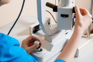 close up photo of Doctor at work machine for checking vision