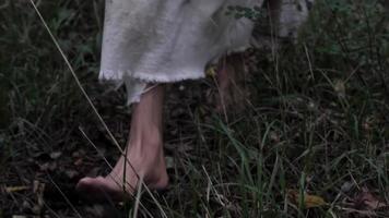 Feet Of Jesus Christ Wearing White Robe Walking In Slow Motion video