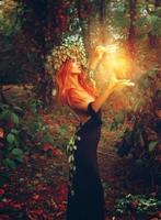 Fantasy photo of young redhair lady wizard