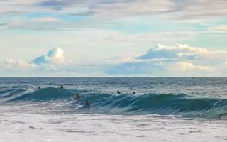 Puerto Escondido Mexico Oaxaca Mexican 2022 Surfer on extremely huge big waves beach Puerto Escondido Mexico. photo