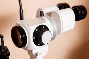 device with a slit lamp for checking vision photo