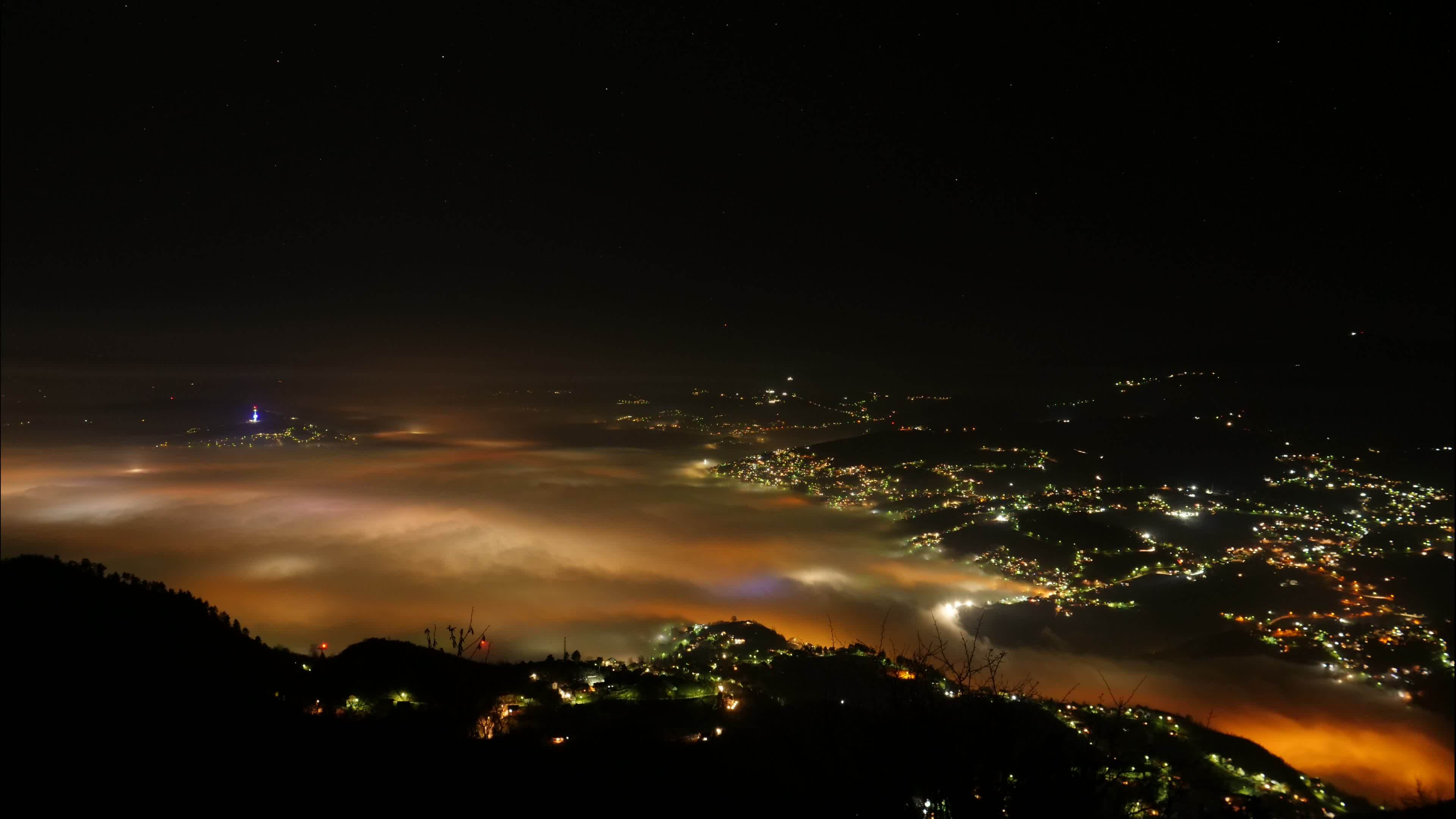Night timelapse of the city Sarajevo under pollution and fog. Capital