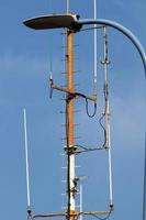 High antenna for emitting and receiving radio waves. photo