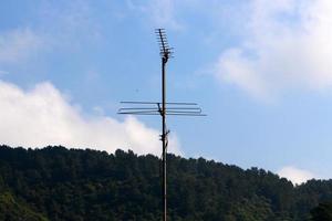 High antenna for emitting and receiving radio waves. photo