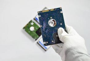 Hard disk drives are still widely used. placed on a white background photo