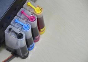 Top view of the printer's ink cartridge, available in 4 colors. photo