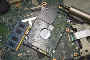 Image of hard disk, RAM, and motherboard viewed from above. photo