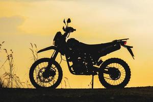 Motocross Kawasaki on the beautiful light mountain, 10 November 2022, Surat Thani, Thailand. photo