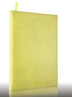 yellow leather notebook on reflect floor and white background photo