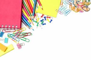 School and office supplies on white background photo