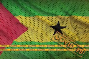 Sao Tome and Principe flag and orange Covid-19 stamp with border tape. Coronavirus or 2019-nCov virus concept photo