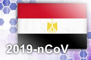 bandera de egipto y composición abstracta digital futurista con inscripción 2019-ncov. concepto de brote de covid-19 foto