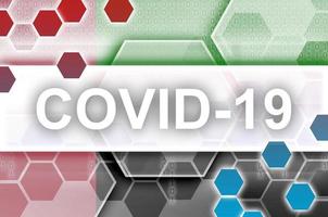 United Arab Emirates flag and futuristic digital abstract composition with Covid-19 inscription. Coronavirus outbreak concept photo