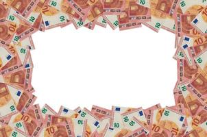 parte del patrón del primer plano del billete de 10 euros con pequeños detalles rojos foto