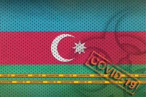 Azerbaijan flag and orange Covid-19 stamp with border tape. Coronavirus or 2019-nCov virus concept photo