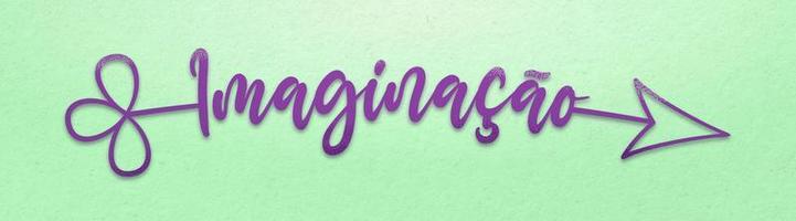 Purple arrow with the word imagination in Brazilian Portuguese on light green wall. Translation - Imagination. photo