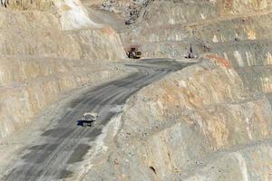 View of Mining activity in Minas de Riotinto in Spain. Apocalypse scenery. Mining village in Andalusia. Earth destruction. Disruption of nature. Extracting natural resources from the Earth. photo