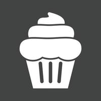 icono de glifo de cupcake de crema invertida vector