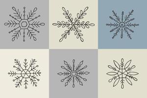 A set of hand-drawn snowflakes. Vector illustration in doodle style. Winter mood. Hello 2023. Merry Christmas and Happy New Year. Gray elements on a gray background.