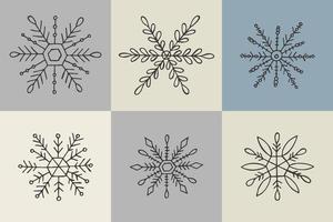 A set of hand-drawn snowflakes. Vector illustration in doodle style. Winter mood. Hello 2023. Merry Christmas and Happy New Year. Gray elements on a gray background.