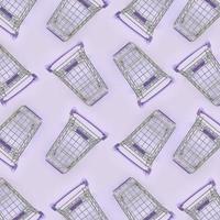 Pattern of many small shopping carts on a violet background. Minimalism flat lay top view photo