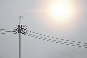 Picture of electric poles, classified as equipment for installation and wiring of electrical systems photo