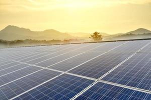 Solar panels, whose upper surface is soiled by rainwater stains, bird droppaings and dust, need to be cleaned to optimize the energy storage of the sun during the day, soft focus. photo