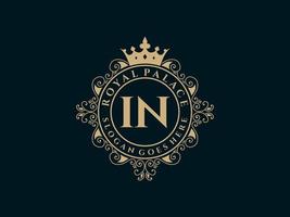 Letter IN Antique royal luxury victorian logo with ornamental frame. vector