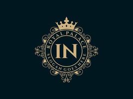 Letter IN Antique royal luxury victorian logo with ornamental frame. vector