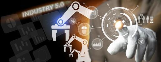 The concept of Industrial Revolution No. 5 is to improve the production process to be more efficient. By working together between humans, intelligent systems and robots photo