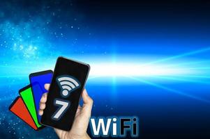 hombre conceptual que usa tecnología wifi 7 conectado al mundo de Internet con nueva tecnología foto