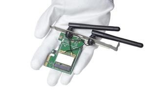 Picture of the device, the wireless receiver in hand. Mounted image type in on a white background photo