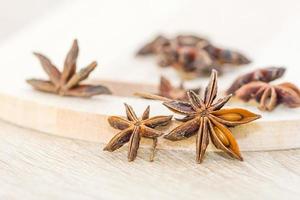Close up Star anise seed on wood photo