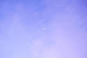 Half Moon in the morning on dark blue sky, photo