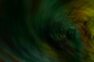 Abstract from green with orange swirl photo