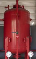 Red nitrogen tank for fire suppression system photo