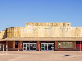 Old Abandoned Obsolete Weathered Store Front Building photo