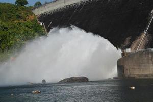Khun Dan Prakarn Chon Dam drain more water from spillway. photo