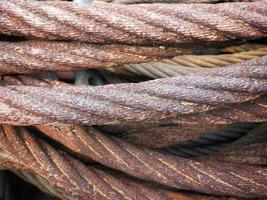 Selective focus of a pile of rusty wire slings. photo