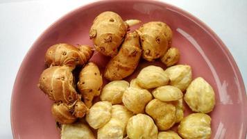 Kemiri and aromatic ginger is herbs photo