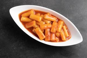 deep fried Korean rice cake tteokbokki, spicy tteokbokki, Korean style food. photo