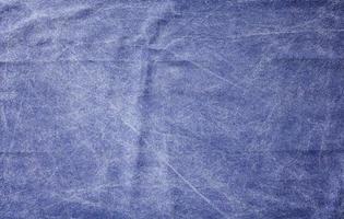 Smooth blue rough fabric texture top view. photo