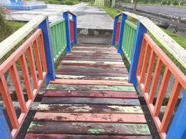 Colorful painted wooden bridge photo